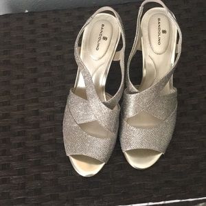 Worn once; silver classic heels
